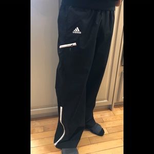 Adidas unisex flared leg training pants.